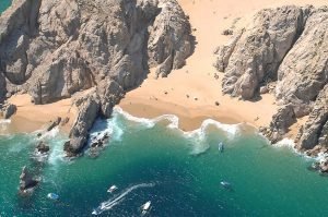 Playa del Amor or Lover's Beach in Cabo San Lucas, with Divorce Beach in the background.